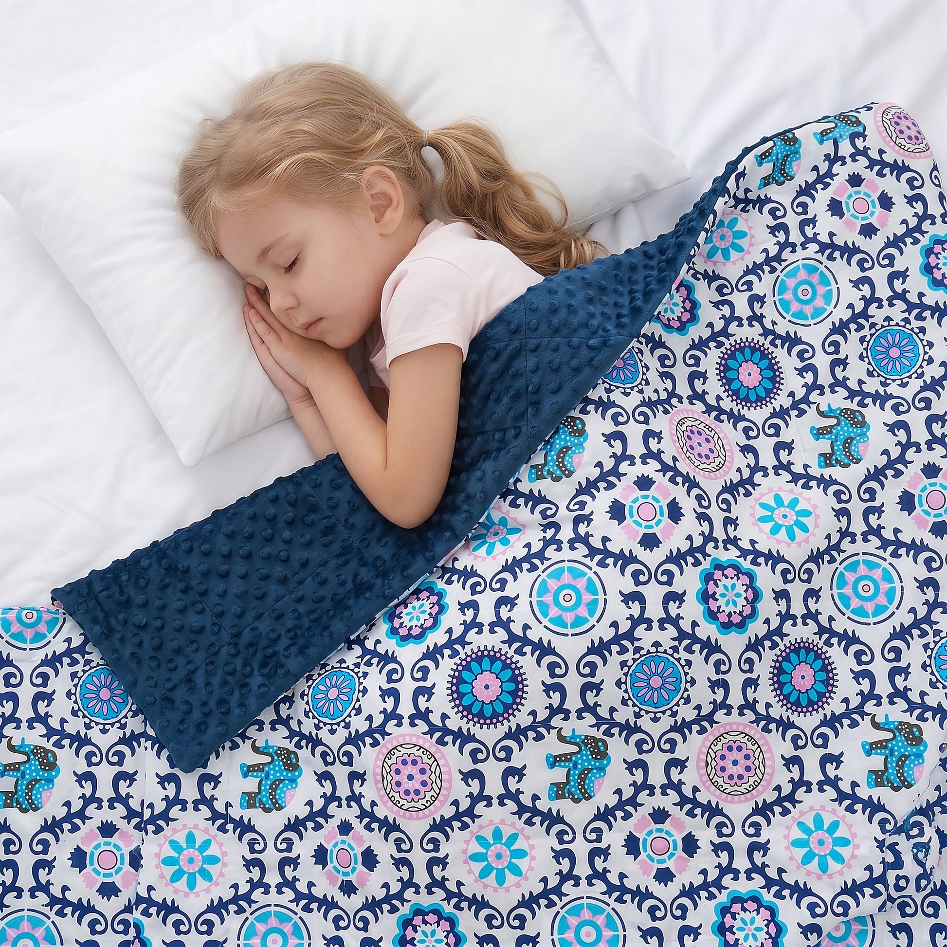 A girl sleeping under the mandala printed weighted blanket