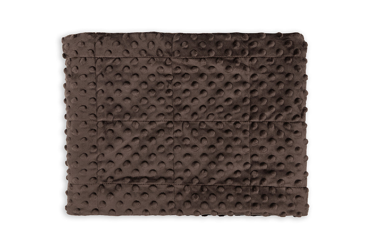 Brown textured blanket on a white background