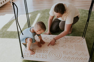 toddler and a parent exploring SENSORY PLATFORM- GOOD WOOD Media 1 of 7