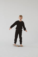Charger l&#39;image dans la galerie, A BOY BALANCING ON THE GREY BALANCE BOARD / TRICK BOARD FOR KIDS- GOOD WOOD