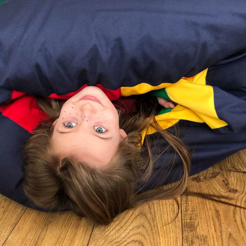 tunnels_tiles with a girl in the sensory bean bag tunnel